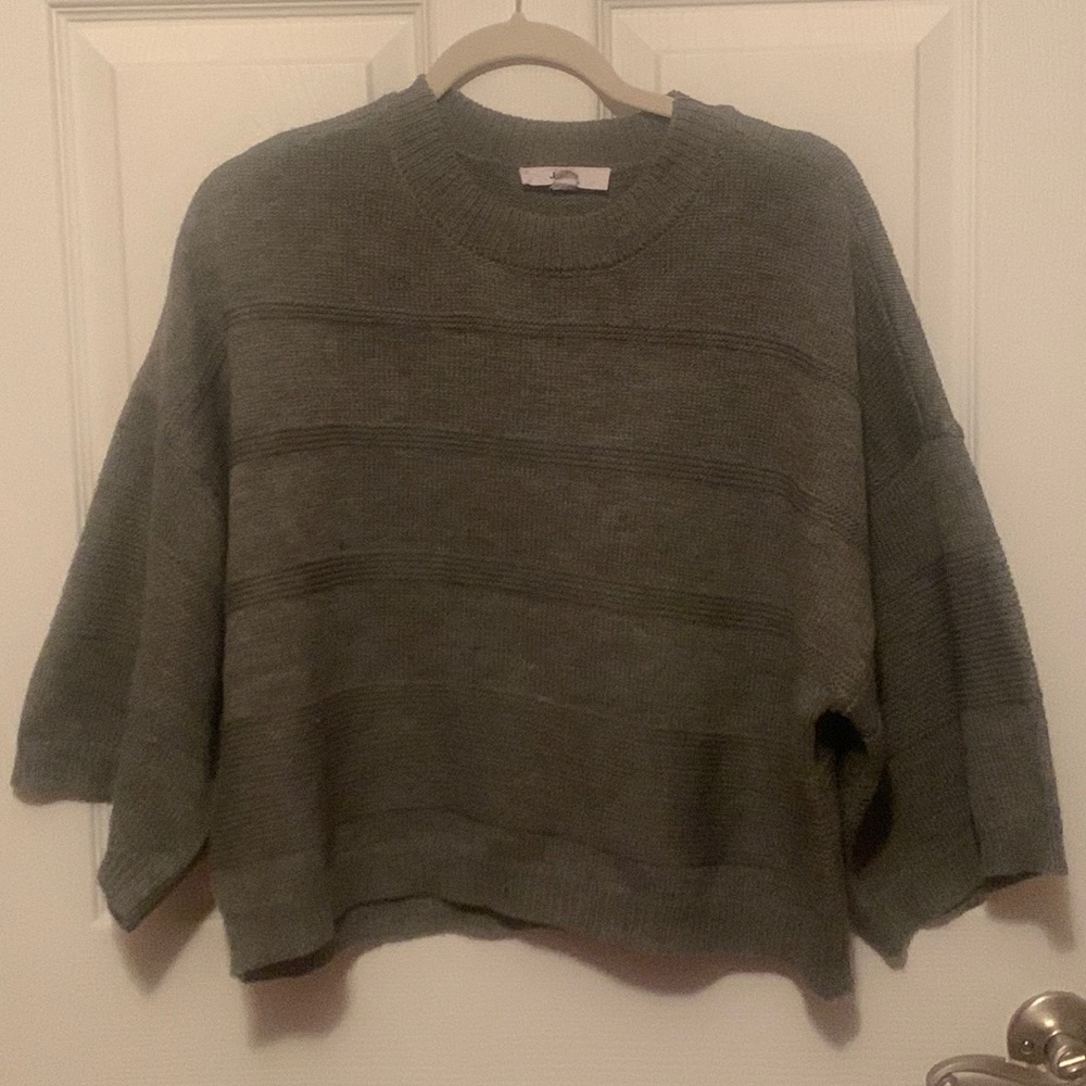 Grey cropped sweater.